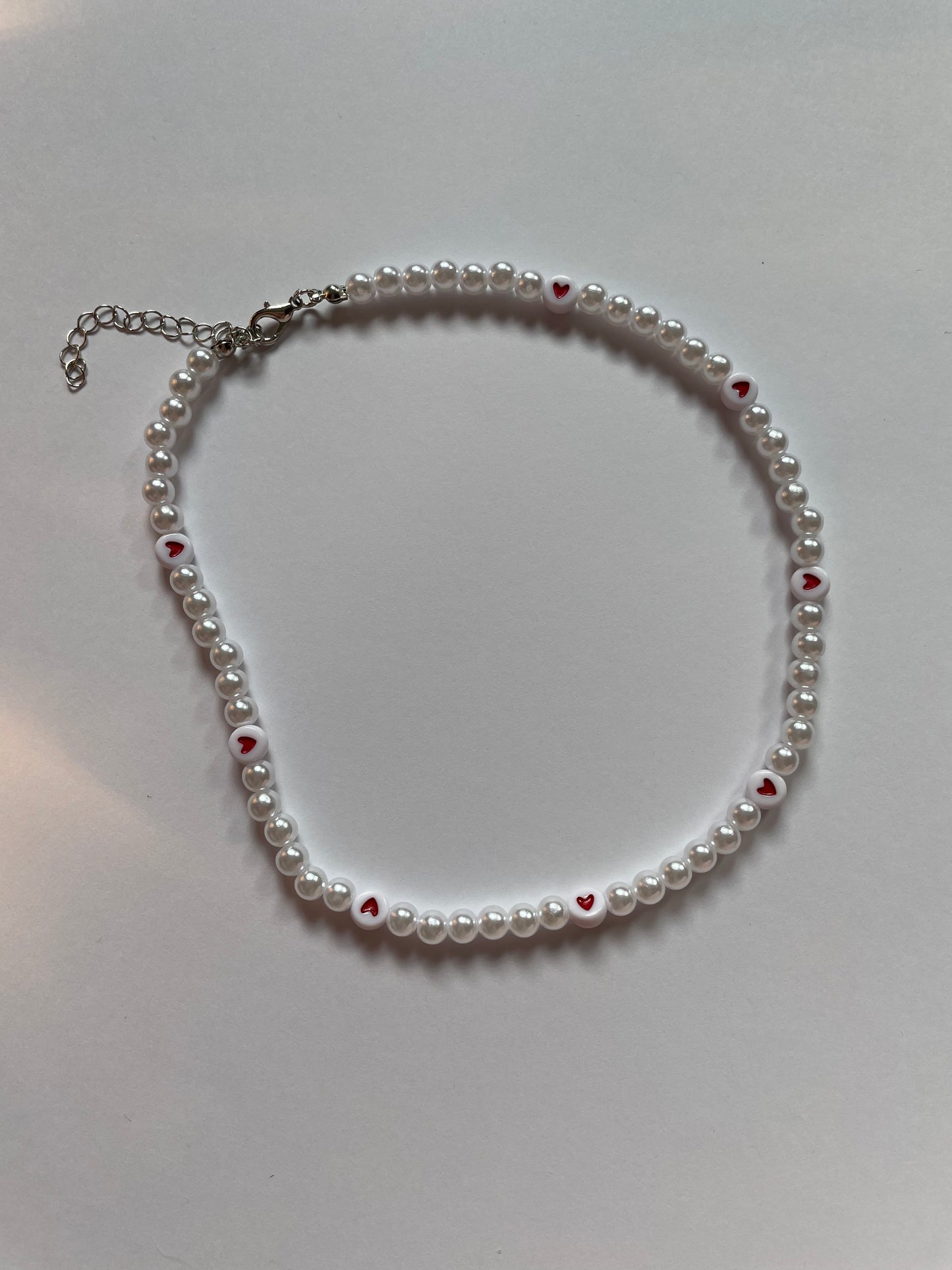 pearl necklace with hearts