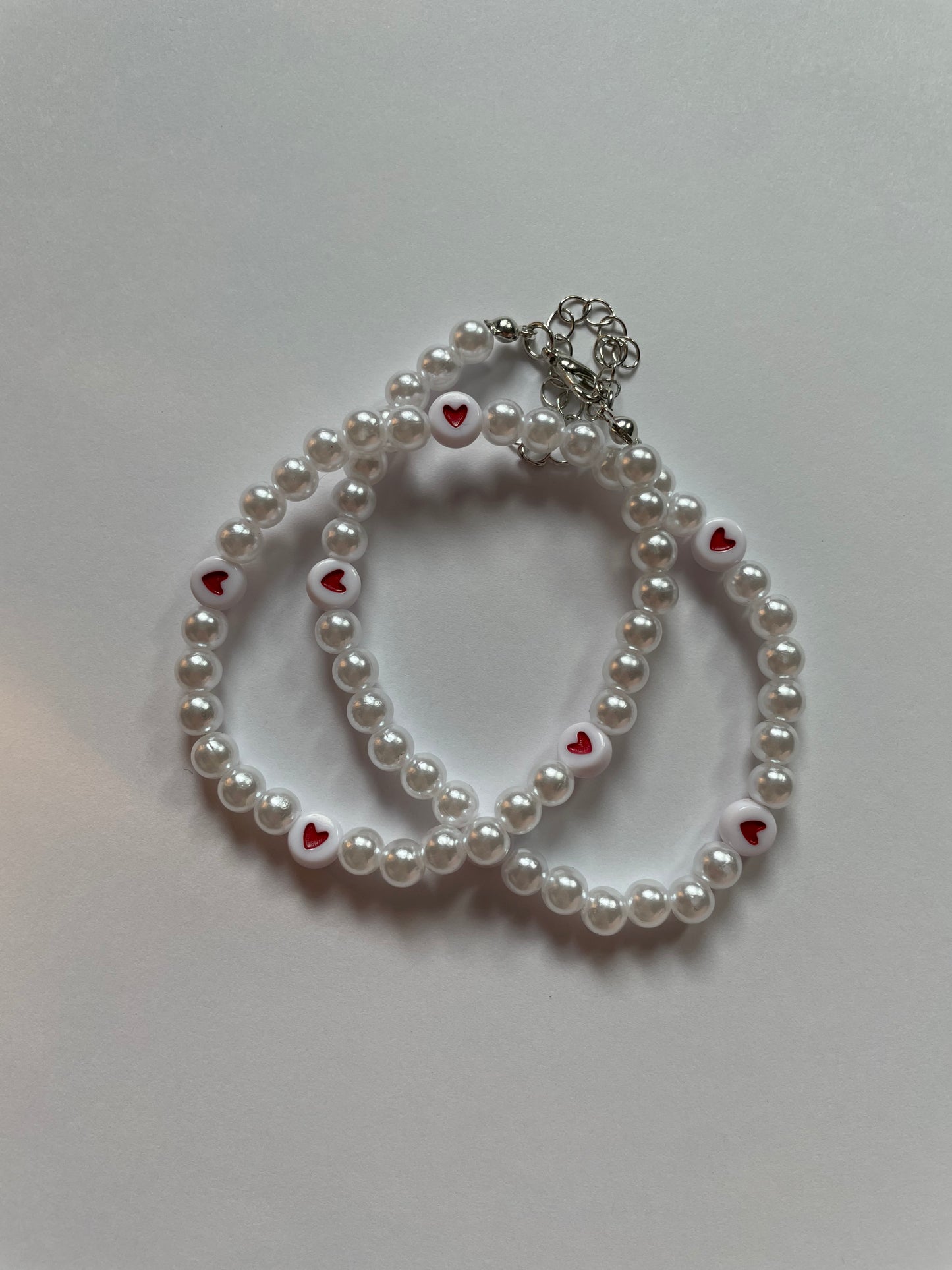 pearl necklace with hearts